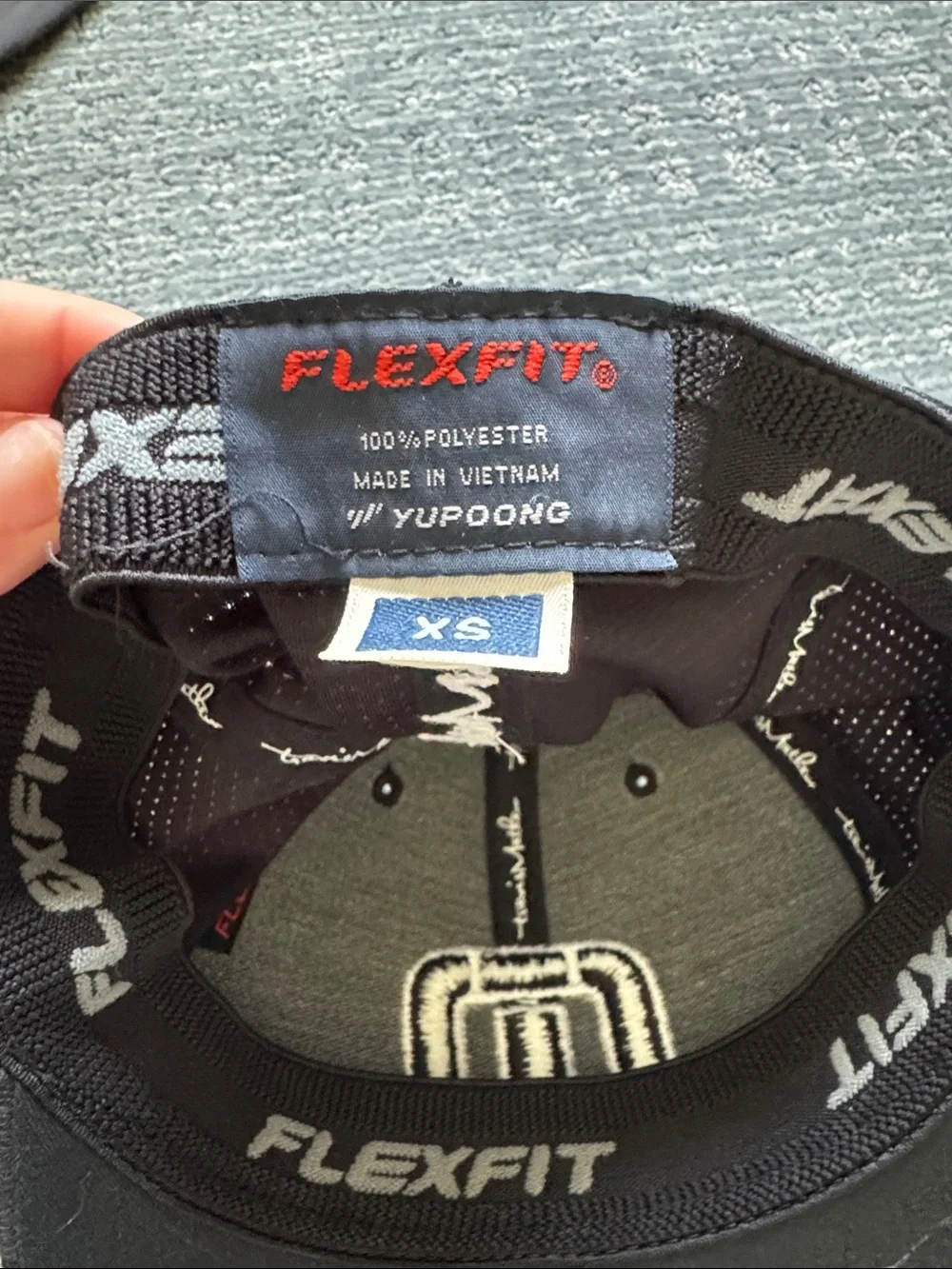 Travis Mathew XS black hat